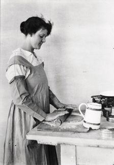 A woman rolls pastry, Rowntree’s factory, York, Yorkshire, 1920