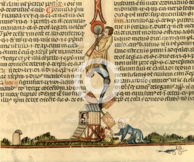 A woman setting a post mill alight, c1340, (1947).  Creator: Unknown.