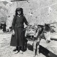 A women and her donkey, Montenegro, Yugoslavia, 1939