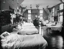 A women's ward in an unidentified hospital, with elaborate decorations. Creator: Unknown