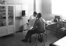 A worker at Trelleborgs rubber factory consulting the works doctor, Trelleborg, Sweden