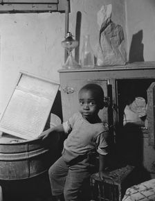 A young boy who lives near the nation's capitol, Washington, D.C, 1942. Creator: Gordon Parks