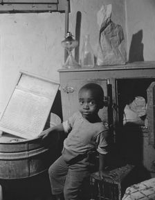 A young boy who lives near the nation's capitol, Washington, D.C, 1942. Creator: Gordon Parks