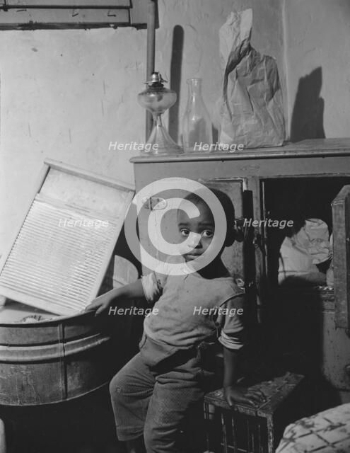 A young boy who lives near the nation's capitol, Washington, D.C, 1942. Creator: Gordon Parks.