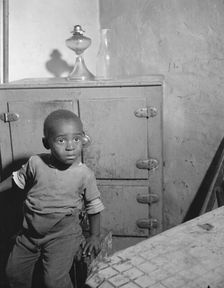 A young boy who lives near the nation's capitol, Washington, D.C., 1942. Creator: Gordon Parks