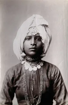 A young Hindu girl, perhaps a princess, in a studio setting, c1900. Creator: Unknown