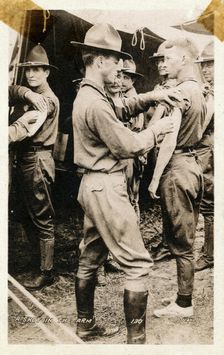 A young man getting a shot in the arm, Fort Sheridan, Illinois, USA, 1920