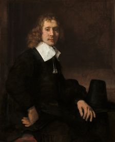 A Young Man Seated at a Table (possibly Govaert Flinck), c. 1660. Creator: Rembrandt Harmensz van Rijn