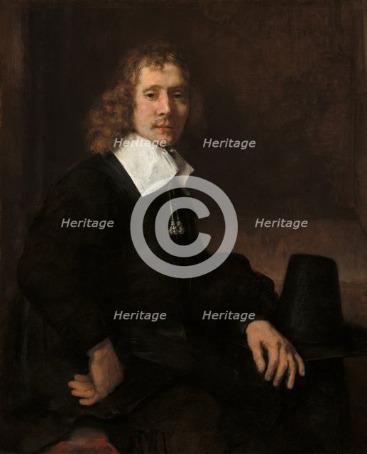A Young Man Seated at a Table (possibly Govaert Flinck), c. 1660. Creator: Rembrandt Harmensz van Rijn.