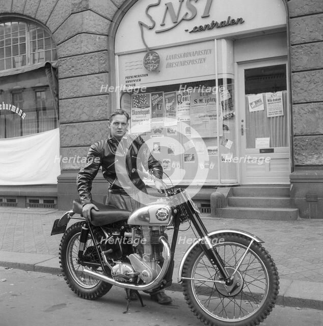 A young man with his imported BSA motorbike, Landskrona, Sweden, c1950s(?). Artist: Unknown