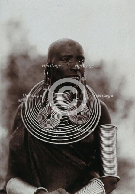 A young Masai woman, wearing much jewellery, approx 1900. Creator: Unknown.