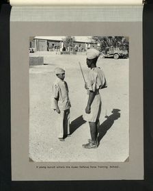 A young recruit enters the Sudan Defence Force Training School, 1964. Creators: Colonial Office, Unknown
