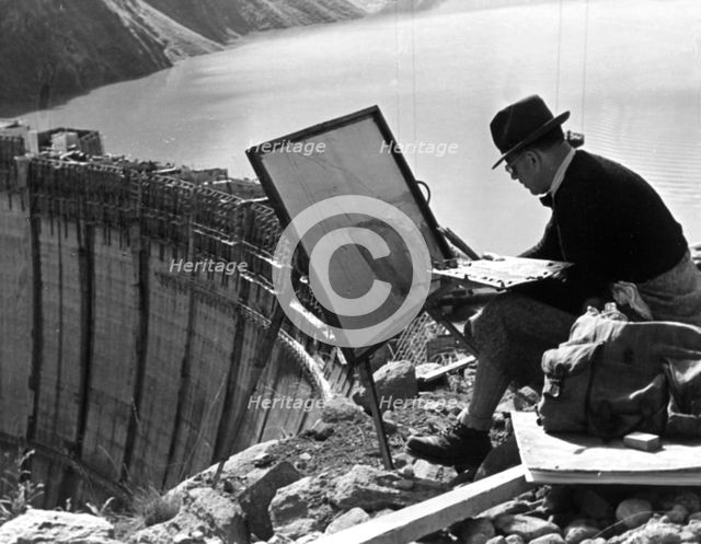 A artist from Linz painting the Limberg Dam, Austria, c1947-1951. Artist: Unknown