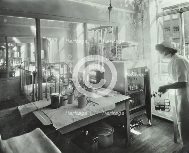 A baby in an isolation unit, Hither Green Hospital, London, 1947. Artist: Unknown.