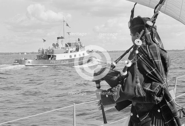 A bagpiper on board the ocean cruiser 'Avalanche' off Landskrona, Sweden, 1965. Creator: Unknown.