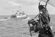 A bagpiper on board the ocean cruiser Avalanche off Landskrona, Sweden, 1965. Creator: Unknown