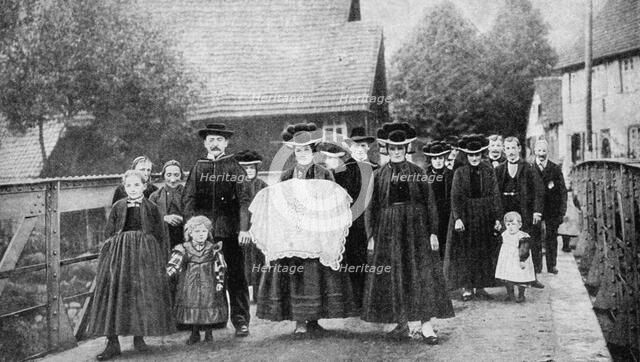 A baptismal procession, Black Forest, Germany, 1922.Artist: Georg Haeckel