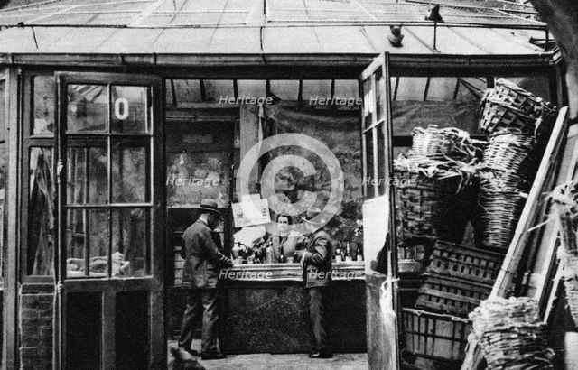 A bar in the Central Market quarter, Paris, 1931.Artist: Ernest Flammarion