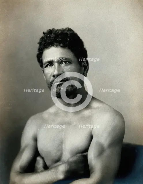A barechested, bearded Samoan man, with his arms crossed, c1900. Creator: Unknown.