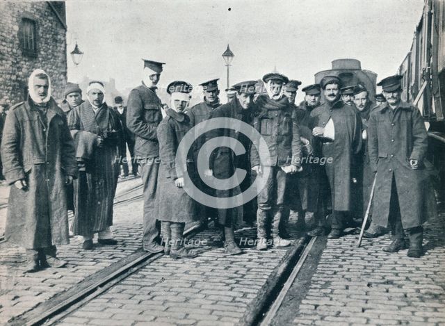 A batch of Neuve Chapelle wounded on a French railway station, 1915. Artist: Unknown