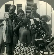 A Beauty Parlor on Zanzibar, Africa - Swahili women take care of their hair c1930s. Creator: Unknown