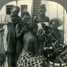 A Beauty Parlor on Zanzibar, Africa - Swahili women take care of their hair c1930s. Creator: Unknown
