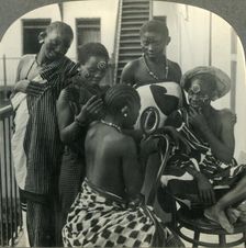 A Beauty Parlor on Zanzibar, Africa - Swahili women take care of their hair c1930s. Creator: Unknown