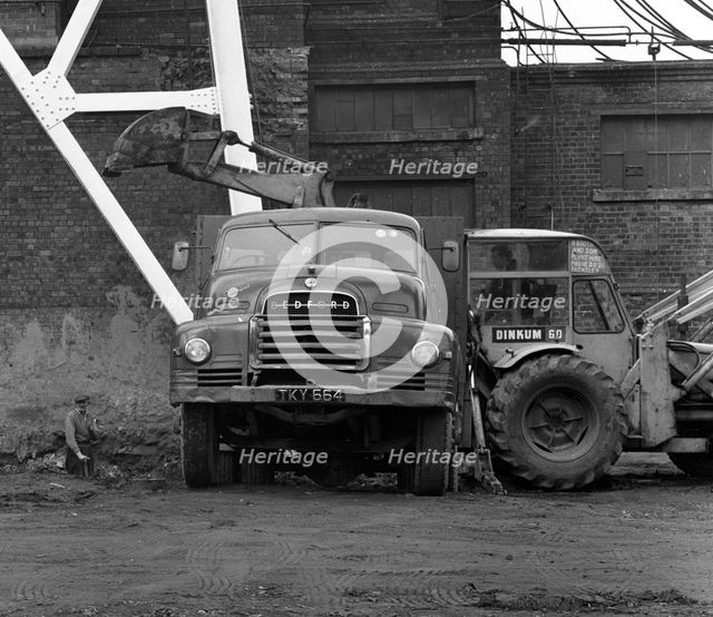 A Bedford 7 ton tipper being loaded at Rossington Colliery, near Doncaster, 1963. Artist: Michael Walters
