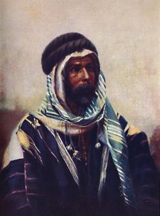 A Bedouin sheikh wearing burnouse, 1902