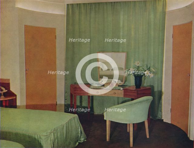 'A bedroom in a house at Portland Place, designed  by Ian Henderson & Co. of London', 1935. Artist: Unknown.