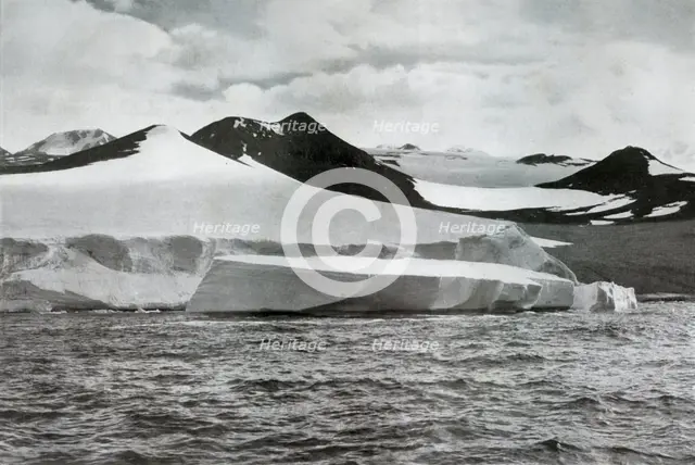 'A Berg Calving from a Glacier at Cape Crozier', c1911, (1913). Artist: Herbert Ponting.