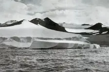 A Berg Calving from a Glacier at Cape Crozier c1911, (1913). Artist: Herbert Ponting