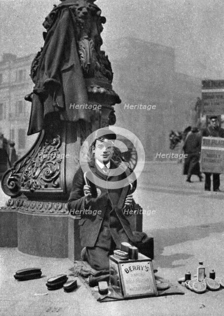 A bootblack, London, 1926-1927. Artist: McLeish