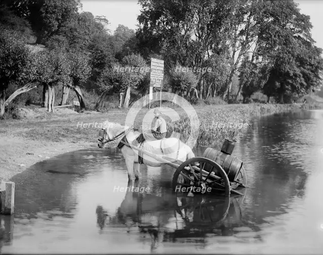 A boy with a horse drawn water cart, filling up in the River Thames, Shiplake, Oxfordshire,1860-1922 Creator: Henry Taunt.