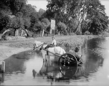 A boy with a horse drawn water cart, filling up in the River Thames, Shiplake, Oxfordshire,1860-1922 Creator: Henry Taunt