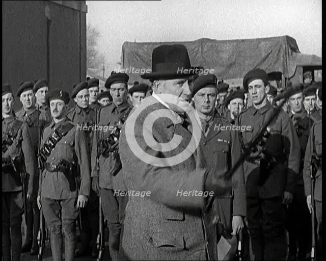 A British Man Inspecting and Speaking to Lines of Irish Auxiliary Soldiers, 1921. Creator: British Pathe Ltd.