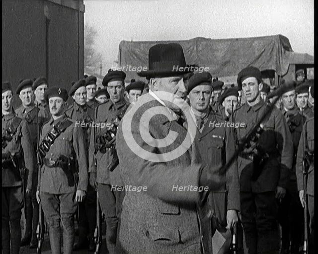A British Man Inspecting and Speaking to Lines of Irish Auxiliary Soldiers, 1921. Creator: British Pathe Ltd.