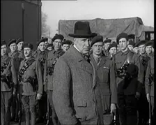 A British Man Inspecting and Speaking to Lines of Irish Auxiliary Soldiers, 1921. Creator: British Pathe Ltd