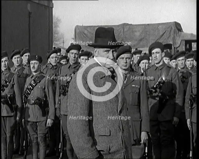 A British Man Inspecting and Speaking to Lines of Irish Auxiliary Soldiers, 1921. Creator: British Pathe Ltd.