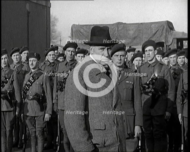 A British Man Inspecting and Speaking to Lines of Irish Auxiliary Soldiers, 1921. Creator: British Pathe Ltd.