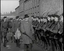 A British Man Inspecting Lines of Irish Auxiliary Soldiers, 1921. Creator: British Pathe Ltd