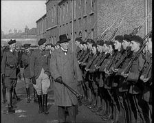 A British Man Inspecting Lines of Irish Auxiliary Soldiers, 1921. Creator: British Pathe Ltd