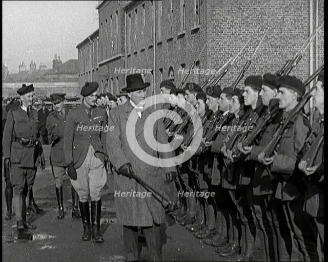 A British Man Inspecting Lines of Irish Auxiliary Soldiers, 1921. Creator: British Pathe Ltd.