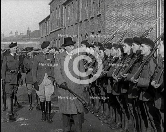 A British Man Inspecting Lines of Irish Auxiliary Soldiers, 1921. Creator: British Pathe Ltd.