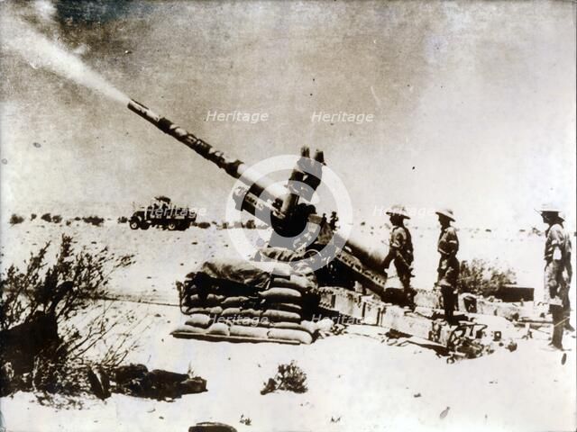 A British artillery piece in action, south of El Alamein, 1942. Artist: Unknown