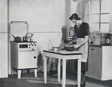 A British kitchen equipped with a cabinet gas cooker 1942