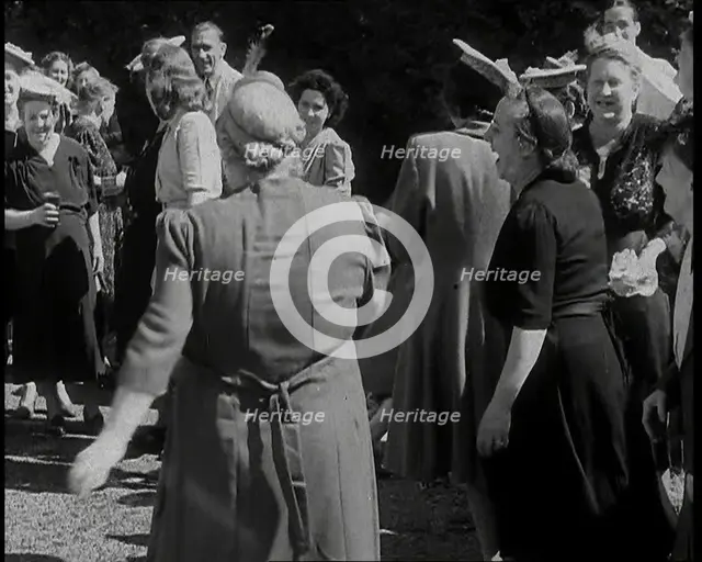 A British Woman Dancing in the Open Air and Sunshine and Kicking Her Leg up High Towards..., 1938. Creator: British Pathe Ltd.