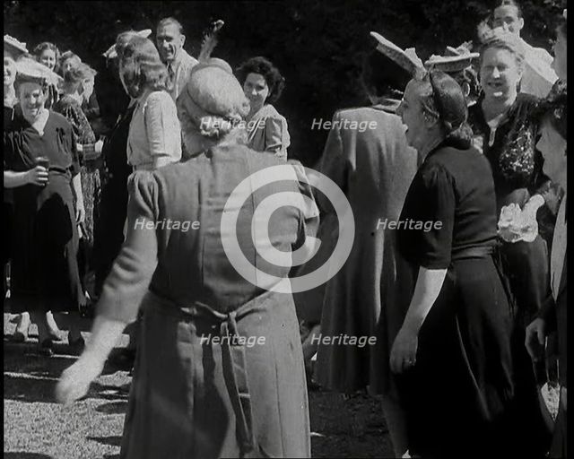 A British Woman Dancing in the Open Air and Sunshine and Kicking Her Leg up High Towards..., 1938. Creator: British Pathe Ltd.