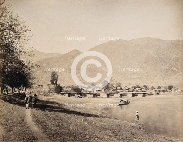 A bridge over the river Jehlum with a town, Baramula, Kashmir, India, c1860s. Creator: Samuel Bourne.