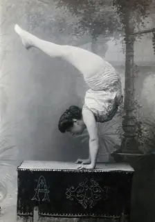 A Bulgarian female acrobat standing on her hands, early 20th century. Creator: Unknown
